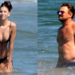Leo DiCaprio y Camila Morrone en la playa